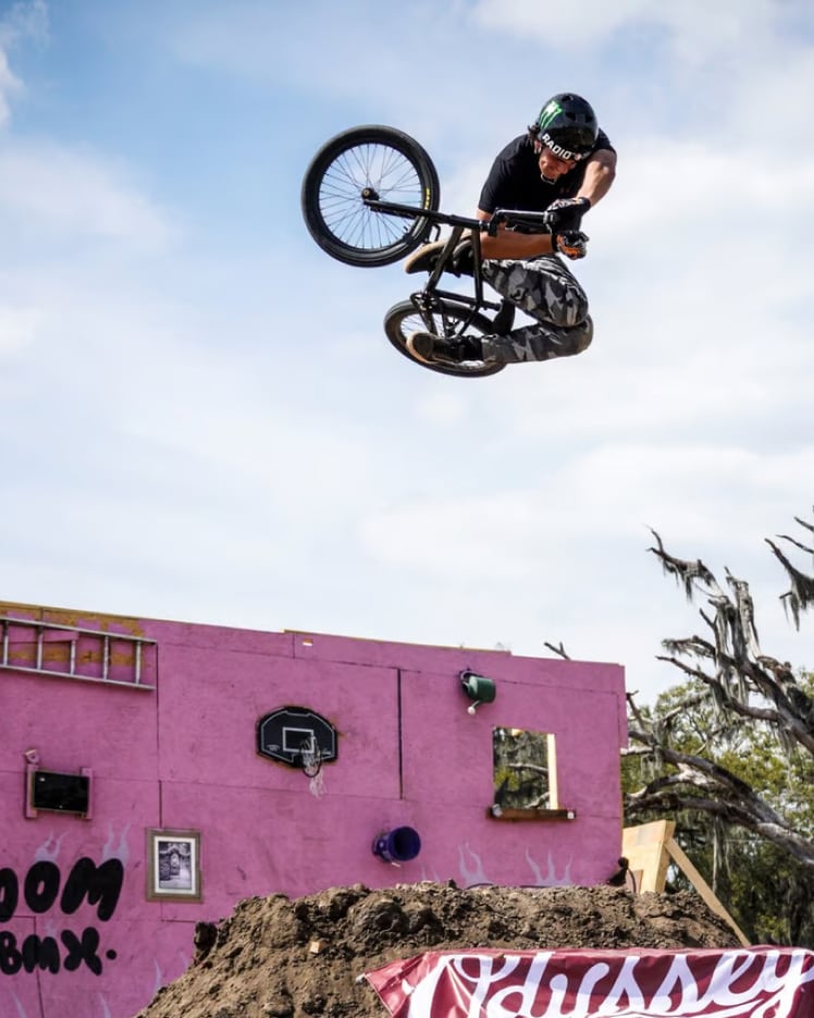 Image: Link to freestyle bikes with a photo of Brady Baker doing a 360 table at Swamp Fest.